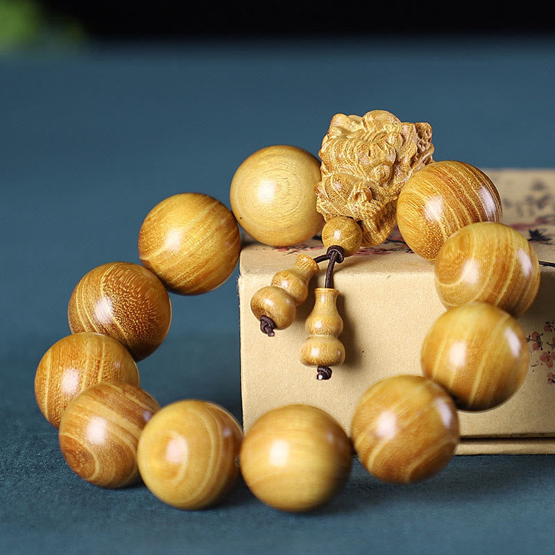 Pulsera Dragón de Madera Roja – Amuleto de Protección Natural