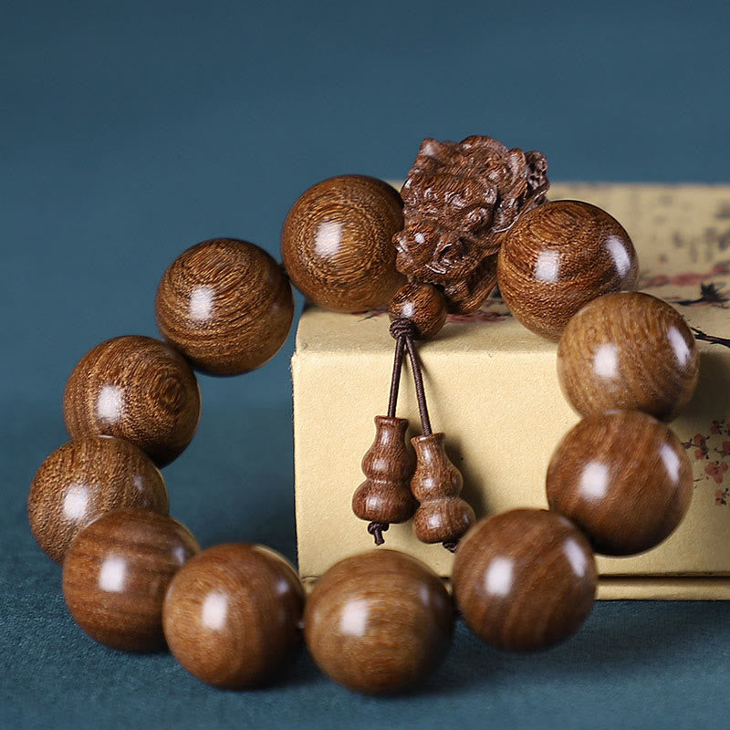 Pulsera Dragón de Madera Roja – Amuleto de Protección Natural
