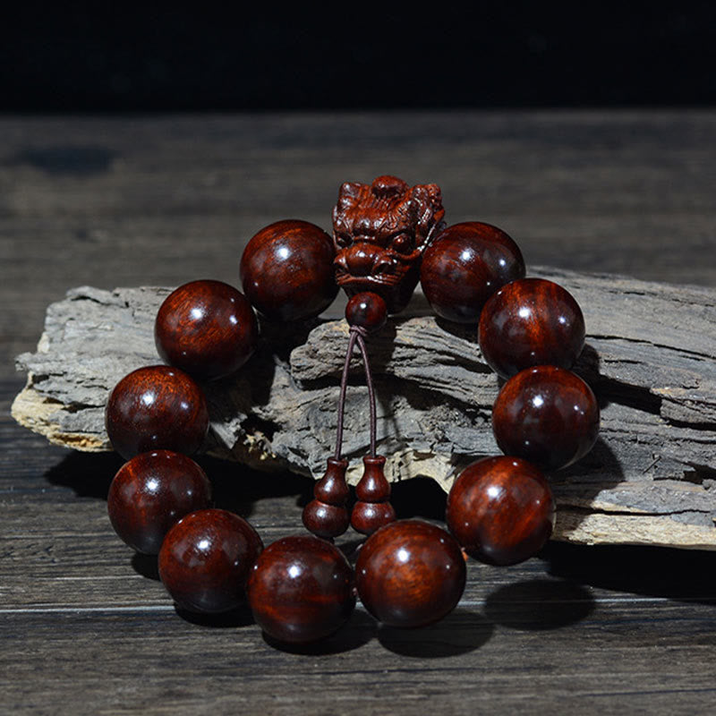 Pulsera Dragón de Madera Roja – Amuleto de Protección Natural